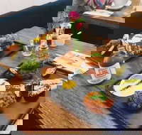 Between Us - Australian Directory