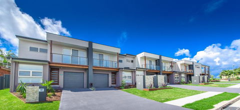 Escape At Nobbys Executive Townhouse 1 74 Pacific Drive - Australian Directory 1