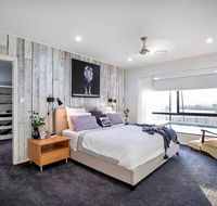 Sunset Penthouse Couples Retreat close to Airlie Beach Champagne on arrival - Australian Directory