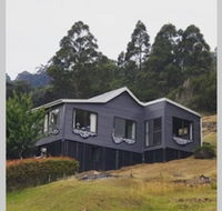 The Tin Dragon - Australian Directory