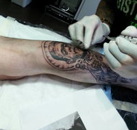 DistINKTion Tattoo - Australian Directory