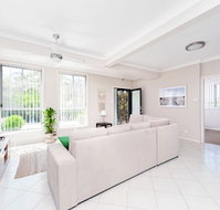 Magnolias at Fingal Bay - Australian Directory