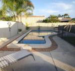 62 Tingira Close Modern lowset home with swimming pool outdoor area ample parking. Pet friendly - Australian Directory