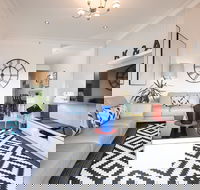 The Clock House Beachfront - Australian Directory
