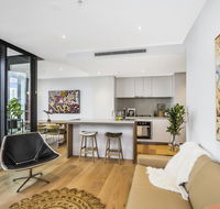 KOZYGURU FORTITUDE VALLEY DESIGNER GRADE 2 BED APT FREE PARKING QFV179-1401 - Australian Directory