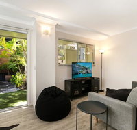 Tropical Townhouse With Two Courtyards and Pool - Australian Directory