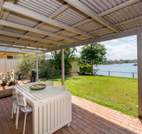 Lowset home on the canal - Dolphin Dr Bongaree - Australian Directory